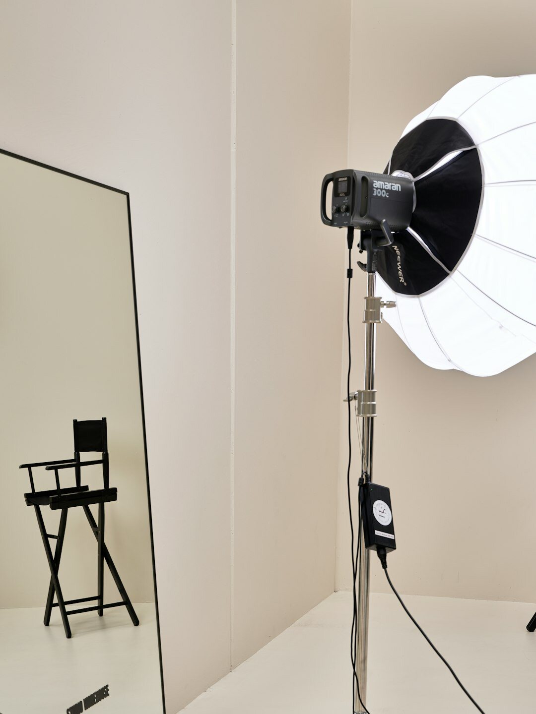 Modern media academy studio interior with lighting and camera equipment