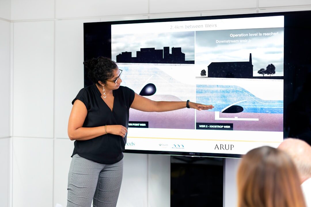 woman giving presentation on stage
