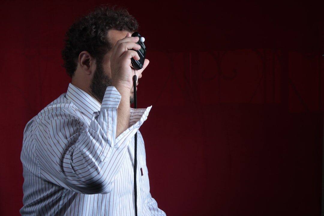 A nervous speaker hesitating in front of a camera and microphone